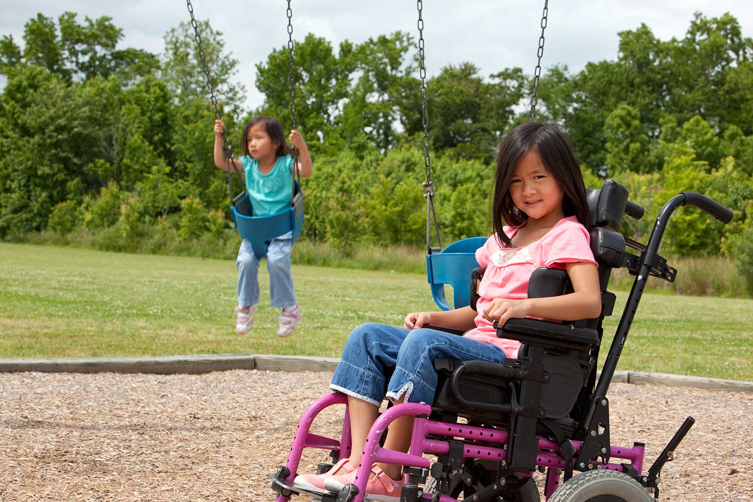 Accessible Playground for Disabled Children - Little Girl in a Wheelchair