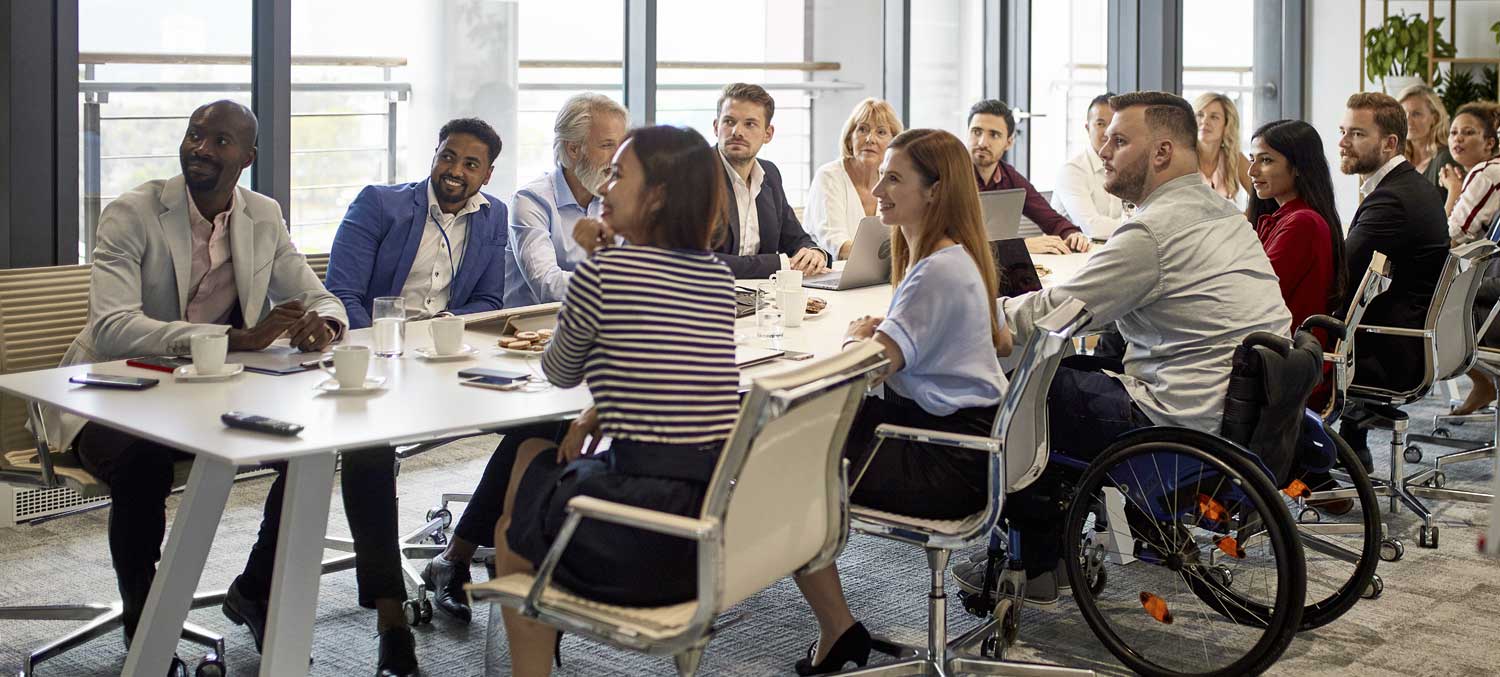 Boardroom Full of People with Wheelchair Access