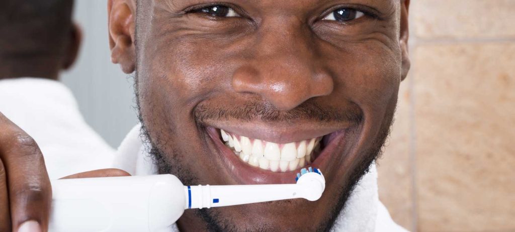 Toothbrush - Adaptive Technology - Man Brushing Teeth