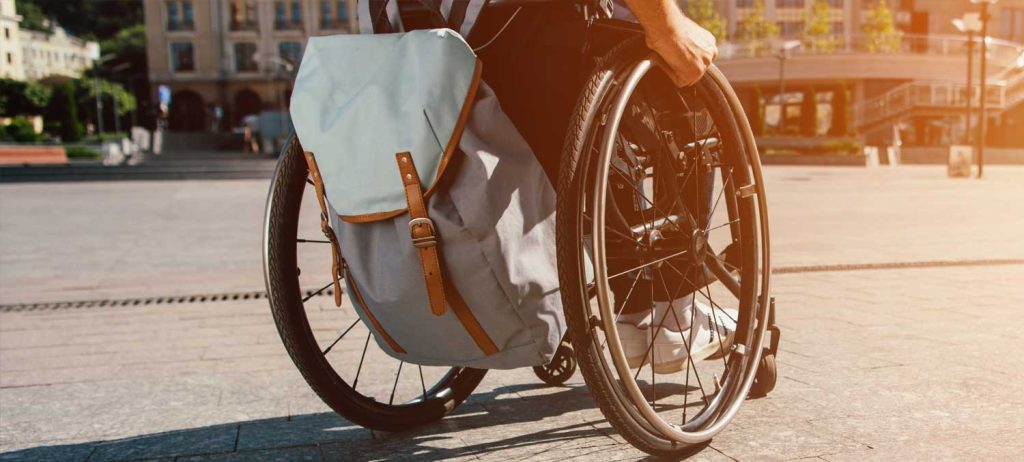 Traveling with a Disability - Person Travelling with a Wheelchair